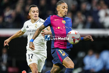 2024-10-26 - Raphael Dias "Raphinha" of FC Barcelona and Lucas Vazquez of Real Madrid during the Spanish championship La Liga football match between Real Madrid CF and FC Barcelona on 26 October 2024 at Santiago Bernabeu stadium in Madrid, Spain - FOOTBALL - SPANISH CHAMP - REAL MADRID V FC BARCELONA - SPANISH LA LIGA - SOCCER