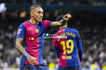 2024-10-26 - Raphael Dias "Raphinha" of FC Barcelona celebrates a goal 0-4 during the Spanish championship La Liga football match between Real Madrid CF and FC Barcelona on 26 October 2024 at Santiago Bernabeu stadium in Madrid, Spain - FOOTBALL - SPANISH CHAMP - REAL MADRID V FC BARCELONA - SPANISH LA LIGA - SOCCER