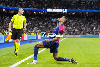 2024-10-26 - Raphael Dias "Raphinha" of FC Barcelona celebrates a goal 0-4 during the Spanish championship La Liga football match between Real Madrid CF and FC Barcelona on 26 October 2024 at Santiago Bernabeu stadium in Madrid, Spain - FOOTBALL - SPANISH CHAMP - REAL MADRID V FC BARCELONA - SPANISH LA LIGA - SOCCER