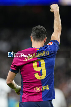 2024-10-26 - Robert Lewandowski of FC Barcelona celebrates a goal during the Spanish championship La Liga football match between Real Madrid CF and FC Barcelona on 26 October 2024 at Santiago Bernabeu stadium in Madrid, Spain - FOOTBALL - SPANISH CHAMP - REAL MADRID V FC BARCELONA - SPANISH LA LIGA - SOCCER