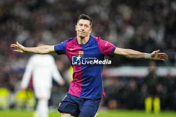 2024-10-26 - Robert Lewandowski of FC Barcelona celebrates a goal during the Spanish championship La Liga football match between Real Madrid CF and FC Barcelona on 26 October 2024 at Santiago Bernabeu stadium in Madrid, Spain - FOOTBALL - SPANISH CHAMP - REAL MADRID V FC BARCELONA - SPANISH LA LIGA - SOCCER