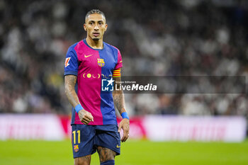 2024-10-26 - Raphael Dias "Raphinha" of FC Barcelona during the Spanish championship La Liga football match between Real Madrid CF and FC Barcelona on 26 October 2024 at Santiago Bernabeu stadium in Madrid, Spain - FOOTBALL - SPANISH CHAMP - REAL MADRID V FC BARCELONA - SPANISH LA LIGA - SOCCER