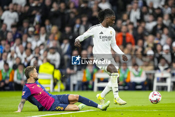 2024-10-26 - Inigo Martinez of FC Barcelona and Eduardo Camavinga of Real Madrid during the Spanish championship La Liga football match between Real Madrid CF and FC Barcelona on 26 October 2024 at Santiago Bernabeu stadium in Madrid, Spain - FOOTBALL - SPANISH CHAMP - REAL MADRID V FC BARCELONA - SPANISH LA LIGA - SOCCER