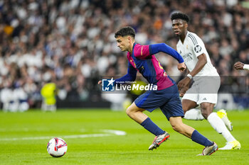 2024-10-26 - Pedro Gonzalez "Pedri" of FC Barcelona during the Spanish championship La Liga football match between Real Madrid CF and FC Barcelona on 26 October 2024 at Santiago Bernabeu stadium in Madrid, Spain - FOOTBALL - SPANISH CHAMP - REAL MADRID V FC BARCELONA - SPANISH LA LIGA - SOCCER