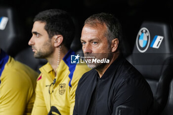 2024-10-26 - Hansi Flick, head coach of FC Barcelona during the Spanish championship La Liga football match between Real Madrid CF and FC Barcelona on 26 October 2024 at Santiago Bernabeu stadium in Madrid, Spain - FOOTBALL - SPANISH CHAMP - REAL MADRID V FC BARCELONA - SPANISH LA LIGA - SOCCER