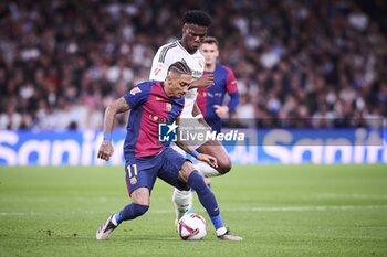 2024-10-26 - Spanish La Liga EA Sports soccer match Real Madrid vs FC Barcelona at Santiago Bernabeu stadium in Madrid, Spain 26 October 2024 Raphinha and Tchouameni 900/Cordon Press - LA LIGA: REAL MADRID VS FC BARCELONA - SPANISH LA LIGA - SOCCER