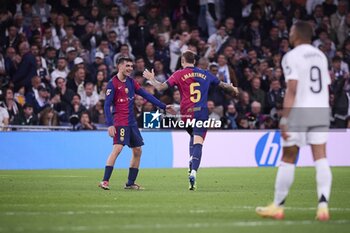 2024-10-26 - Spanish La Liga EA Sports soccer match Real Madrid vs FC Barcelona at Santiago Bernabeu stadium in Madrid, Spain 26 October 2024 Pedri and I?igo Martinez celebrate a goal 900/Cordon Press - LA LIGA: REAL MADRID VS FC BARCELONA - SPANISH LA LIGA - SOCCER