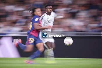 2024-10-26 - Spanish La Liga EA Sports soccer match Real Madrid vs FC Barcelona at Santiago Bernabeu stadium in Madrid, Spain 26 October 2024 Vinicius Jr and Kounde 900/Cordon Press - LA LIGA: REAL MADRID VS FC BARCELONA - SPANISH LA LIGA - SOCCER