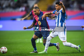 2024-11-03 - Raphael DIAS BELLOLI (Raphinha) of Barcelona and Omar EL HILALI of Espanyol Barcelona during the Spanish championship La Liga football match between FC Barcelona and RCD Espanyol de Barcelona on 3 November 2024 at Estadi Olimpic Lluis Companys in Barcelona, Spain - FOOTBALL - SPANISH CHAMP - BARCELONA V ESPANYOL - SPANISH LA LIGA - SOCCER