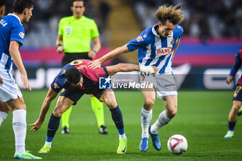 2024-11-03 - Robert LEWANDOWSKI of Barcelona and Alex KRAL of Espanyol Barcelona during the Spanish championship La Liga football match between FC Barcelona and RCD Espanyol de Barcelona on 3 November 2024 at Estadi Olimpic Lluis Companys in Barcelona, Spain - FOOTBALL - SPANISH CHAMP - BARCELONA V ESPANYOL - SPANISH LA LIGA - SOCCER