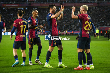 2024-11-03 - Dani OLMO of Barcelona celebrate his goal with Marc CASADO of Barcelona, Raphael DIAS BELLOLI (Raphinha) of Barcelona and Robert LEWANDOWSKI of Barcelona during the Spanish championship La Liga football match between FC Barcelona and RCD Espanyol de Barcelona on 3 November 2024 at Estadi Olimpic Lluis Companys in Barcelona, Spain - FOOTBALL - SPANISH CHAMP - BARCELONA V ESPANYOL - SPANISH LA LIGA - SOCCER