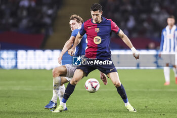 2024-11-03 - Robert Lewandowski of FC Barcelona and Alex Kral of RCD Espanyol during the Spanish championship La Liga football match between FC Barcelona and RCD Espanyol on 3 November 2024 at Estadi Olímpic Lluís Companys in Barcelona, Spain - FOOTBALL - SPANISH CHAMP - BARCELONA V ESPANYOL - SPANISH LA LIGA - SOCCER