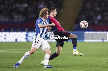 2024-11-03 - Robert Lewandowski of FC Barcelona and Alex Kral of RCD Espanyol during the Spanish championship La Liga football match between FC Barcelona and RCD Espanyol on 3 November 2024 at Estadi Olímpic Lluís Companys in Barcelona, Spain - FOOTBALL - SPANISH CHAMP - BARCELONA V ESPANYOL - SPANISH LA LIGA - SOCCER