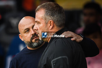 2024-11-03 - Manolo GONZALEZ of Espanyol Barcelona and Hansi FLICK of Barcelona during the Spanish championship La Liga football match between FC Barcelona and RCD Espanyol de Barcelona on 3 November 2024 at Estadi Olimpic Lluis Companys in Barcelona, Spain - FOOTBALL - SPANISH CHAMP - BARCELONA V ESPANYOL - SPANISH LA LIGA - SOCCER