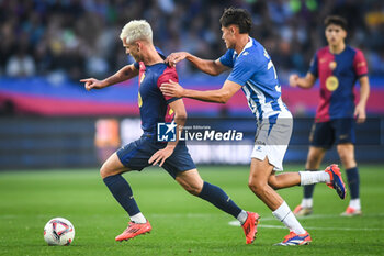 2024-11-03 - Dani OLMO of Barcelona and Rafel BAUZA of Espanyol Barcelona during the Spanish championship La Liga football match between FC Barcelona and RCD Espanyol de Barcelona on 3 November 2024 at Estadi Olimpic Lluis Companys in Barcelona, Spain - FOOTBALL - SPANISH CHAMP - BARCELONA V ESPANYOL - SPANISH LA LIGA - SOCCER