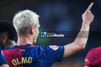 2024-11-03 - Dani OLMO of Barcelona celebrates his goal during the Spanish championship La Liga football match between FC Barcelona and RCD Espanyol de Barcelona on 3 November 2024 at Estadi Olimpic Lluis Companys in Barcelona, Spain - FOOTBALL - SPANISH CHAMP - BARCELONA V ESPANYOL - SPANISH LA LIGA - SOCCER