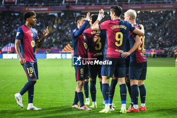 2024-11-03 - Dani OLMO of Barcelona celebrate his goal with teammates during the Spanish championship La Liga football match between FC Barcelona and RCD Espanyol de Barcelona on 3 November 2024 at Estadi Olimpic Lluis Companys in Barcelona, Spain - FOOTBALL - SPANISH CHAMP - BARCELONA V ESPANYOL - SPANISH LA LIGA - SOCCER