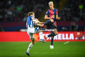 2024-11-03 - Alex KRAL of Espanyol Barcelona and Dani OLMO of Barcelona during the Spanish championship La Liga football match between FC Barcelona and RCD Espanyol de Barcelona on 3 November 2024 at Estadi Olimpic Lluis Companys in Barcelona, Spain - FOOTBALL - SPANISH CHAMP - BARCELONA V ESPANYOL - SPANISH LA LIGA - SOCCER