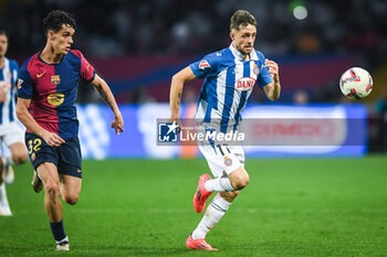 2024-11-03 - Hector FORT of Barcelona and Jofre CARRERAS of Espanyol Barcelona during the Spanish championship La Liga football match between FC Barcelona and RCD Espanyol de Barcelona on 3 November 2024 at Estadi Olimpic Lluis Companys in Barcelona, Spain - FOOTBALL - SPANISH CHAMP - BARCELONA V ESPANYOL - SPANISH LA LIGA - SOCCER