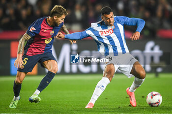 2024-11-03 - Inigo MARTINEZ of Barcelona and Walid CHEDDIRA of Espanyol Barcelona during the Spanish championship La Liga football match between FC Barcelona and RCD Espanyol de Barcelona on 3 November 2024 at Estadi Olimpic Lluis Companys in Barcelona, Spain - FOOTBALL - SPANISH CHAMP - BARCELONA V ESPANYOL - SPANISH LA LIGA - SOCCER