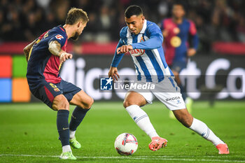 2024-11-03 - Inigo MARTINEZ of Barcelona and Walid CHEDDIRA of Espanyol Barcelona during the Spanish championship La Liga football match between FC Barcelona and RCD Espanyol de Barcelona on 3 November 2024 at Estadi Olimpic Lluis Companys in Barcelona, Spain - FOOTBALL - SPANISH CHAMP - BARCELONA V ESPANYOL - SPANISH LA LIGA - SOCCER