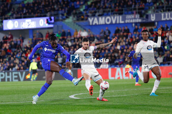 2024-11-22 - Chrisantus Uche of Getafe CF and Javi Sanchez of Real Valladolid during the Spanish championship La Liga football match between Getafe CF and Real Valladolid on November 22, 2024 at Coliseum de Getafe stadium in Getafe, Spain - FOOTBALL - SPANISH CHAMP - GETAFE V VALLADOLID - SPANISH LA LIGA - SOCCER