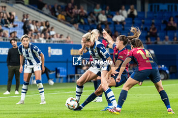 2024-09-13 - Klara Chaynova of Real Sociedad and Patri Guijarro of FC Barcelona during the Spanish championship La ligaF football match between FC Barcelona and Real Sociedad on September 13 at Johan Cruyff stadium in Barcelona, Spain - BARCELONA VS REAL SOCIEDAD - SPANISH PRIMERA DIVISION WOMEN - SOCCER