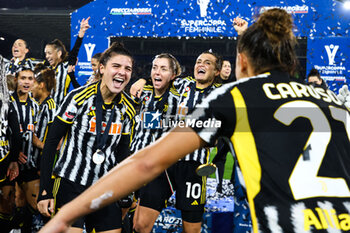 2024-01-07 - Sofia Cantore (Juventus Women), Linda Sembrant (Juventus Women), Cristiana Girelli (Juventus Women) and Arianna Caruso (Juventus Women) celebrate the victory of the Italian Super Cup - AS ROMA VS JUVENTUS FC - WOMEN SUPERCOPPA - SOCCER