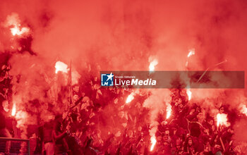 2024-02-10 - Lausanne Switzerland, 02/10/2024: FC Lausanne-Sport supporters burn red smoke during FC Stade Lausanne -Ouchy versus FC Lausanne-Sport . FC Stade-Ouchy versus FC Lausanne-Sport took place at Lausanne Olympic Stadium - STADE LAUSANNE-OUCHY VS LAUSANNE SPORT - SWISS SUPER LEAGUE - SOCCER