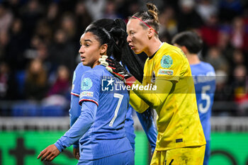 2024-02-23 - Sakina KARCHAOUI of France and Pauline PEYRAUD MAGNIN of France during the UEFA Women's Nations League, Semi-final football match between France and Germany on February 23, 2024 at Groupama Stadium in Decines-Charpieu near Lyon, France - FOOTBALL - WOMEN'S NATIONS LEAGUE - FRANCE V GERMANY - UEFA NATIONS LEAGUE - SOCCER