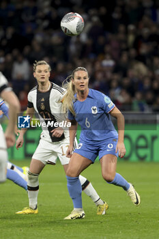 2024-02-23 - Amandine Henry of France, left Alexandra Popp of Germany during the UEFA Women's Nations League, Semi-final football match between France and Germany on February 23, 2024 at Groupama Stadium in Decines-Charpieu near Lyon, France - FOOTBALL - WOMEN'S NATIONS LEAGUE - FRANCE V GERMANY - UEFA NATIONS LEAGUE - SOCCER