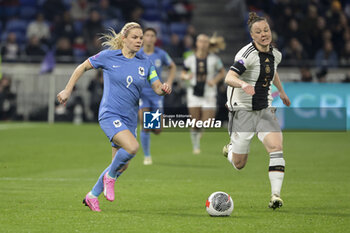 2024-02-23 - Eugenie Le Sommer of France, Marina Hegering of Germany during the UEFA Women's Nations League, Semi-final football match between France and Germany on February 23, 2024 at Groupama Stadium in Decines-Charpieu near Lyon, France - FOOTBALL - WOMEN'S NATIONS LEAGUE - FRANCE V GERMANY - UEFA NATIONS LEAGUE - SOCCER
