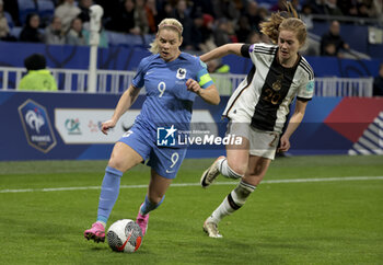 2024-02-23 - Eugenie Le Sommer of France, Sjoeke Nusken of Germany during the UEFA Women's Nations League, Semi-final football match between France and Germany on February 23, 2024 at Groupama Stadium in Decines-Charpieu near Lyon, France - FOOTBALL - WOMEN'S NATIONS LEAGUE - FRANCE V GERMANY - UEFA NATIONS LEAGUE - SOCCER