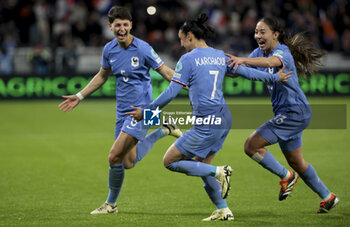 2024-02-23 - Sakina Karchaoui of France #3 celebrates her goal with Elisa De Almeida and Selma Bacha during the UEFA Women's Nations League, Semi-final football match between France and Germany on February 23, 2024 at Groupama Stadium in Decines-Charpieu near Lyon, France - FOOTBALL - WOMEN'S NATIONS LEAGUE - FRANCE V GERMANY - UEFA NATIONS LEAGUE - SOCCER