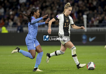 2024-02-23 - Giulia Gwinn of Germany, left Grace Geyoro of France during the UEFA Women's Nations League, Semi-final football match between France and Germany on February 23, 2024 at Groupama Stadium in Decines-Charpieu near Lyon, France - FOOTBALL - WOMEN'S NATIONS LEAGUE - FRANCE V GERMANY - UEFA NATIONS LEAGUE - SOCCER