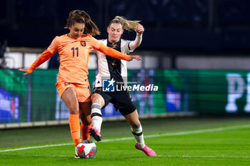 2024-02-28 - Lieke Martens of the Netherlands battle for possession with Sarai Linder of Germany during the UEFA Women's Nations League, third place football match between Netherlands and Germany on February 28, 2024 at Abe Lenstra Stadion in Heerenveen, Netherlands - FOOTBALL - WOMEN'S NATIONS LEAGUE - 3RD PLACE - NETHERLANDS V GERMANY - UEFA NATIONS LEAGUE - SOCCER