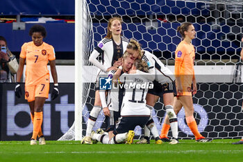 2024-02-28 - Lea Schüller of Germany celebrates after scoring her teams second goal, Alexandra Popp of Germany, Giulia Gwinn of Germany during the UEFA Women's Nations League, third place football match between Netherlands and Germany on February 28, 2024 at Abe Lenstra Stadion in Heerenveen, Netherlands - FOOTBALL - WOMEN'S NATIONS LEAGUE - 3RD PLACE - NETHERLANDS V GERMANY - UEFA NATIONS LEAGUE - SOCCER