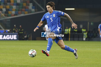 2024-10-14 - Riccardo Calafiori of Italy play the ball during Italy vs Israel, matchday 4 of League A of Uefa Nations League 2025, game at Bluenergy stadium - stadio Friuli in Udine (UD), Italy, on October 14, 2024. - ITALY VS ISRAEL - UEFA NATIONS LEAGUE - SOCCER