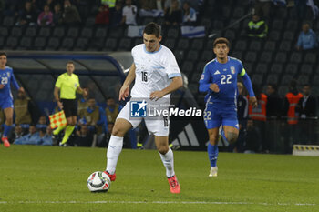 2024-10-14 - Oscar Gloukh of Israel kick the ball  during Italy vs Israel, matchday 4 of League A of Uefa Nations League 2025, game at Bluenergy stadium - stadio Friuli in Udine (UD), Italy, on October 14, 2024. - ITALY VS ISRAEL - UEFA NATIONS LEAGUE - SOCCER