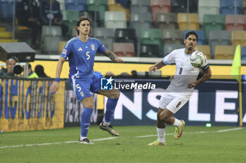 2024-10-14 - Riccardo Calafiori of Italy play the ball during Italy vs Israel, matchday 4 of League A of Uefa Nations League 2025, game at Bluenergy stadium - stadio Friuli in Udine (UD), Italy, on October 14, 2024. - ITALY VS ISRAEL - UEFA NATIONS LEAGUE - SOCCER