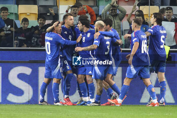 2024-10-14 - Matteo Retegui of Italy celebrates after scoring goal on penalty during Italy vs Israel, matchday 4 of League A of Uefa Nations League 2025, game at Bluenergy stadium - stadio Friuli in Udine (UD), Italy, on October 14, 2024. - ITALY VS ISRAEL - UEFA NATIONS LEAGUE - SOCCER