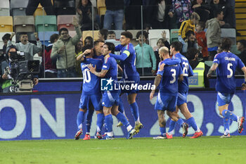 2024-10-14 - Matteo Retegui of Italy celebrates after scoring goal on penalty during Italy vs Israel, matchday 4 of League A of Uefa Nations League 2025, game at Bluenergy stadium - stadio Friuli in Udine (UD), Italy, on October 14, 2024. - ITALY VS ISRAEL - UEFA NATIONS LEAGUE - SOCCER