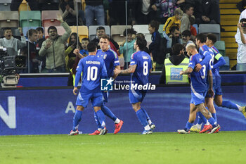 2024-10-14 - Matteo Retegui of Italy celebrates after scoring goal on penalty during Italy vs Israel, matchday 4 of League A of Uefa Nations League 2025, game at Bluenergy stadium - stadio Friuli in Udine (UD), Italy, on October 14, 2024. - ITALY VS ISRAEL - UEFA NATIONS LEAGUE - SOCCER