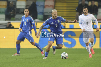 2024-10-14 - Federico Dimarco of Italy competes for the ball with Liel Abada of Israel during Italy vs Israel, matchday 4 of League A of Uefa Nations League 2025, game at Bluenergy stadium - stadio Friuli in Udine (UD), Italy, on October 14, 2024. - ITALY VS ISRAEL - UEFA NATIONS LEAGUE - SOCCER