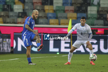 2024-10-14 - Federico Dimarco of Italy competes for the ball with Liel Abada of Israel during Italy vs Israel, matchday 4 of League A of Uefa Nations League 2025, game at Bluenergy stadium - stadio Friuli in Udine (UD), Italy, on October 14, 2024. - ITALY VS ISRAEL - UEFA NATIONS LEAGUE - SOCCER