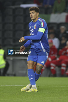 2024-10-14 - Giovani Di Lorenzo of Italy play the ball during Italy vs Israel, matchday 4 of League A of Uefa Nations League 2025, game at Bluenergy stadium - stadio Friuli in Udine (UD), Italy, on October 14, 2024. - ITALY VS ISRAEL - UEFA NATIONS LEAGUE - SOCCER