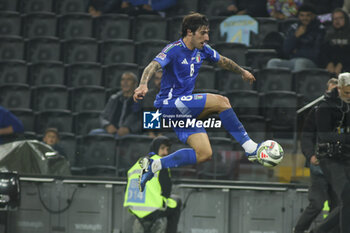 2024-10-14 - Sandro Tonali of Italy play the ball during Italy vs Israel, matchday 4 of League A of Uefa Nations League 2025, game at Bluenergy stadium - stadio Friuli in Udine (UD), Italy, on October 14, 2024. - ITALY VS ISRAEL - UEFA NATIONS LEAGUE - SOCCER