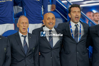 2024-09-06 - coach of Italy Marco Domenichini, Luciano Spalletti head coach of Italy and Italy Head of Delegation Gianluigi Buffon during the National Anthems - FRANCE VS ITALY - UEFA NATIONS LEAGUE - SOCCER