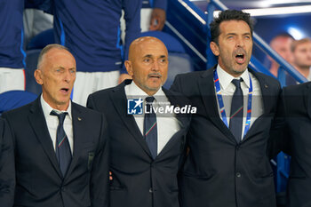 2024-09-06 - coach of Italy Marco Domenichini, Luciano Spalletti head coach of Italy and Italy Head of Delegation Gianluigi Buffon during the National Anthems - FRANCE VS ITALY - UEFA NATIONS LEAGUE - SOCCER