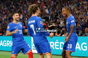 2024-09-06 - Bradley Barcola of France celebrates after scoring a goal with Antoine Griezmann and Theo Hernandez of France - FRANCE VS ITALY - UEFA NATIONS LEAGUE - SOCCER